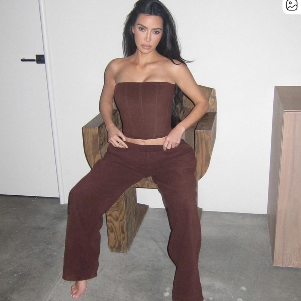 SKIMS Chocolate Lounge Pants and corset top and brown zip up